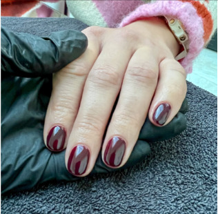 Burgundy nail art manicure on short natural nails